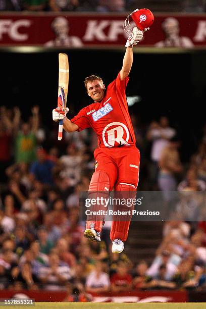 Aaron Finch of the Renegades celebrates his century during the Big Bash League match between the Melbourne Renegades and the Melbourne Stars at...