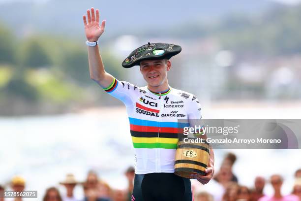 Remco Evenepoel of Belgium and Team Soudal - Quick Step celebrates at podium as race winner with the Txapela hat trophy during the 43rd Donostia San...