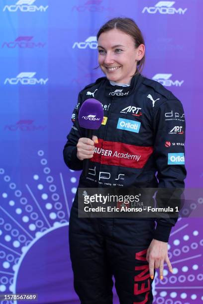 Pole position qualifier Lena Buhler of Switzerland and ART Grand Prix speaks to the media in parc ferme after qualifying for the F1 Academy Series...