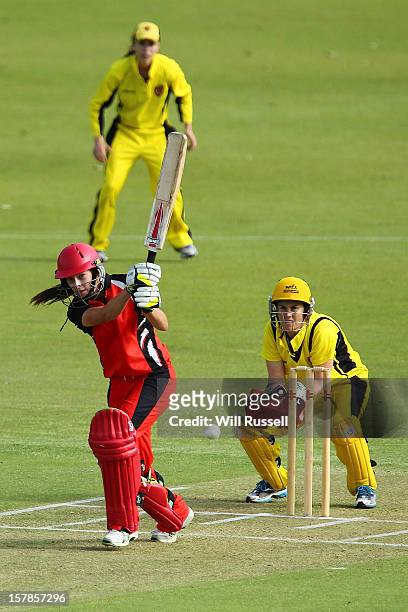 Megan Schutt of the Scorpions hits the ball during the Women's Twenty20 match between the Western Australia Fury and the South Australia Scorpions at...
