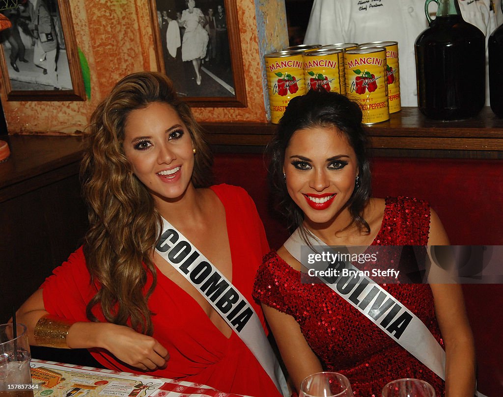 The 2012 Miss Universe Contestants Celebrate Their Arrival In Las Vegas At Buca Di Beppo Italian Restaurant