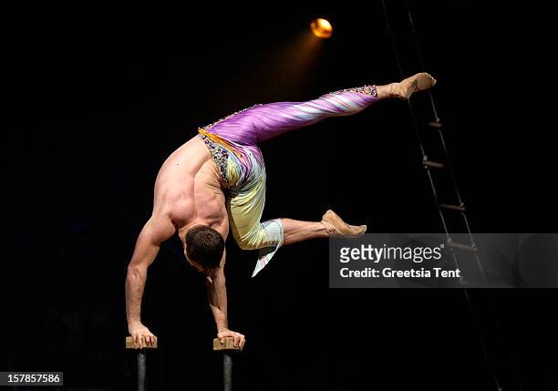 Acrobat of Cirque du Soleil performs 'Alegria' at Ahoy on December 6, 2012 in Rotterdam, Netherlands.