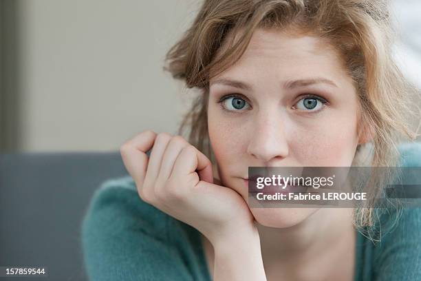 woman looking sad - uncertainty stock pictures, royalty-free photos & images