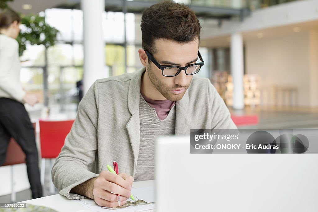 Male fashion designer working in an office