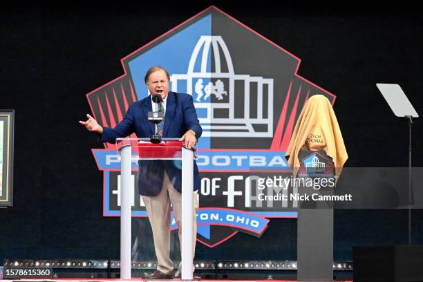 Host Chris Berman speaks during the 2023 Pro Football Hall of Fame Enshrinement Ceremony at Tom Benson Hall Of Fame Stadium on August 05, 2023 in...