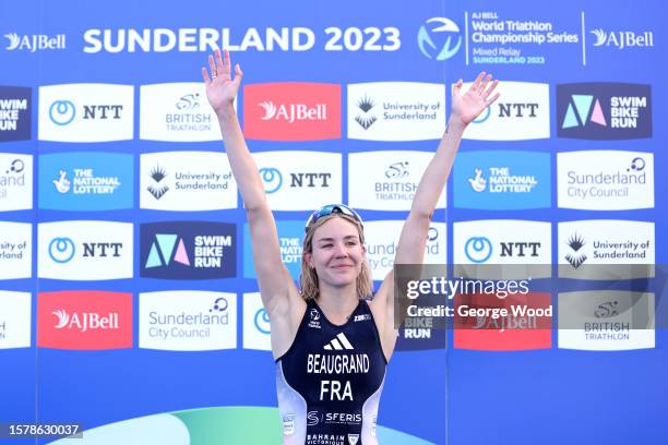 Cassandre Beaugrand of France celebrates on the podium after winning gold in the Elite Women's race during the World Triathlon Series Sunderland at...