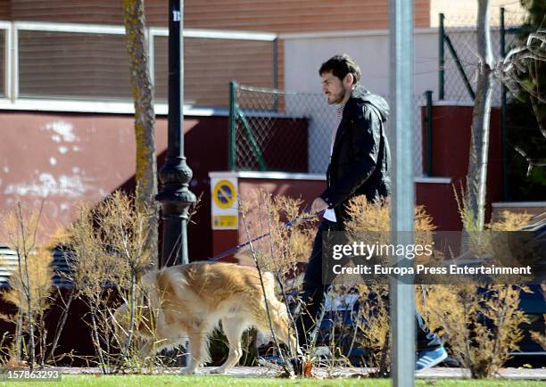 Iker Casillas is seen with his pet dog on December 6, 2012 in Madrid, Spain.