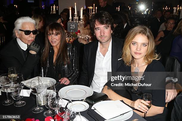 Karl lagerfeld, Babeth Djian, Antoine Arnault and Natalia Vodianova attend the Babeth Djian Hosts Dinner For Rwanda To The Benefit Of A.E.M. On...