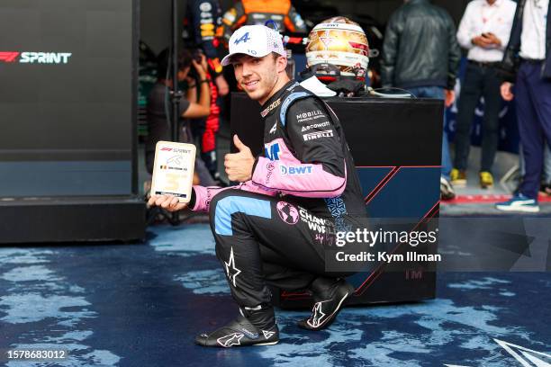 Pierre Gasly of France and Alpine F1 poses with trophy during the Sprint Shootout/Sprint ahead of the F1 Grand Prix of Belgium at Circuit de...