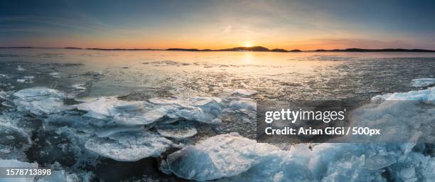 scenic view of sea against sky during sunset,turku,finland - arian stock pictures, royalty-free photos & images