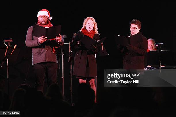 Ryan Speedo Green, Renée Tatum, and Andrew Stenson perform a selection of carols at The Metropolitan Opera Tree Lighting Ceremony at The Metropolitan...