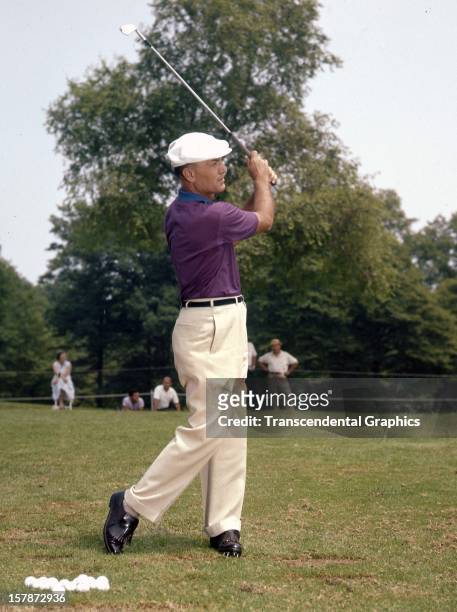 Golfer Ben Hogan shows his form warming up at the Master in Augusta, Georgia in April of 1959.