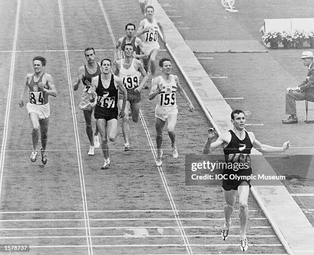 Peter Snell of New Zealands wins the 1500 metres ahead of Josef Odlozil of Czechoslovakia and fellow Zealander John Davies at the 1964 Olympic Games...