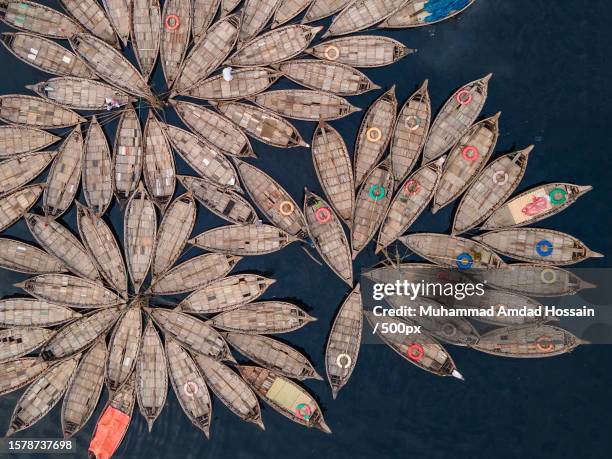 aerial view of boats moored at harbor,dhaka district,dhaka division,bangladesh - bangladesh aerial stock pictures, royalty-free photos & images