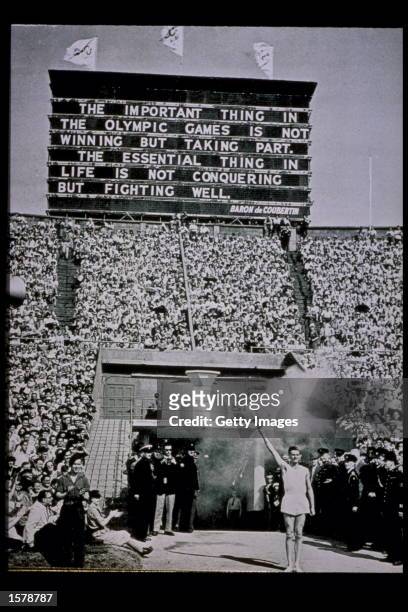 The Olympic Torch is presented at the 1948 Summer Olympic Games at Wembley Stadium in London, England. Mandatory Credit: Allsport/Allsport