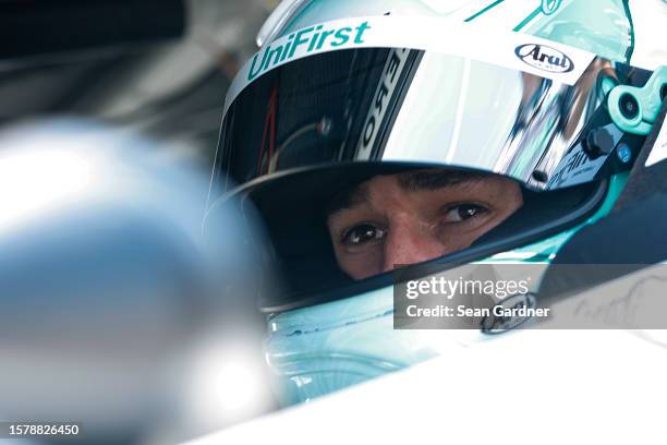 Chase Elliott, driver of the UniFirst Chevrolet, sits in his car during qualifying for the NASCAR Cup Series Cook Out 400 at Richmond Raceway on July...