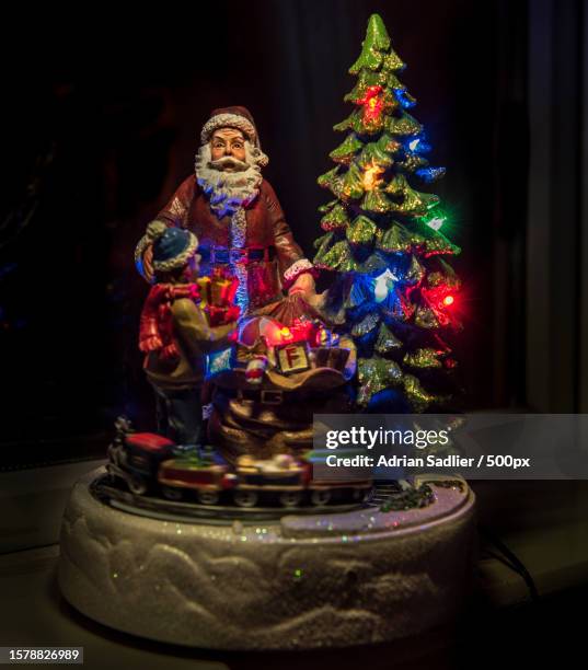 close-up of illuminated christmas music box on table at night,dublin city,county dublin,ireland - music box stock pictures, royalty-free photos & images