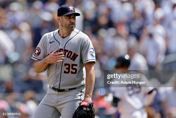 Justin Verlander of the Houston Astros reacts after Aaron Judge of the New York Yankees flew out during the fifth inning at Yankee Stadium on August...