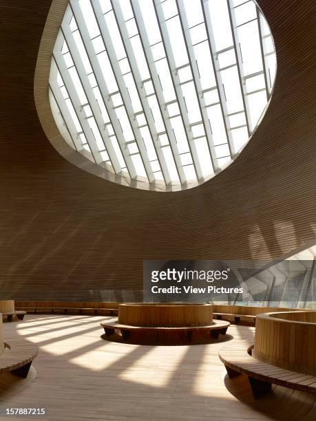 Ordos Museum, Mad Architects, Ordos, Inner Mongolia, China Hall Interior With Oval Windows And Circular Seating Benches, Mad Architects, China,...