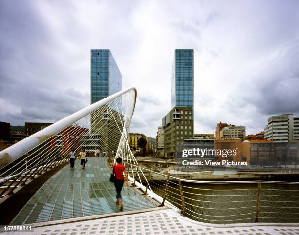 Isozaki Atea, Bilbao, Spain, Architect Arata Isozaki Isozaki Atea General View From Across The River With Footbridge.