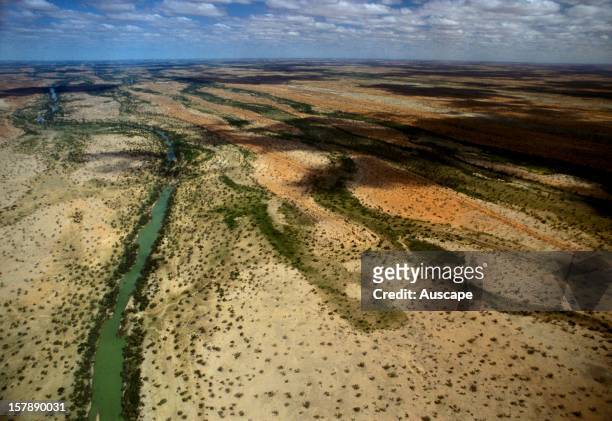Eyre Creek, draining water from the northern end of the Great Dividing Range into Lake Machattie, an ancient sump once lying at the base of an inland...