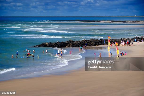 Elliott Heads, a popular tourist destination: coastal village with a small ocean beach and an expansive sandy river delta for relaxation and...