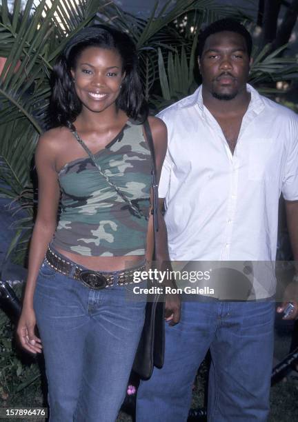 Actress Gabrielle Union and husband athlete Chris Howard attend the American Eagle Outfitters Showroom Grand Opening Celebration on June 27, 2001 at...