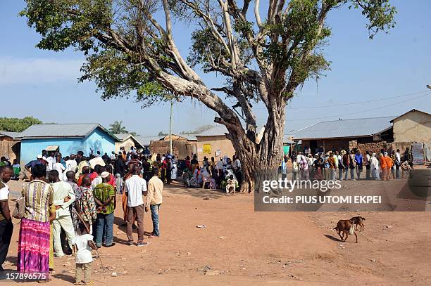 Voters queue to cast her voter at Bole polling station, Bole Bamboi constituency a northern region on December 7, 2012 as Ghana voted in a...