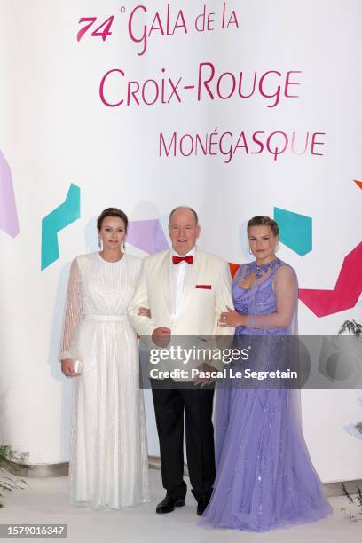 Charlene, Princess of Monaco, Albert II, Prince of Monaco and Camille Gottlieb attend the Red Cross Ball 2023 on July 29, 2023 in Monaco, Monaco.