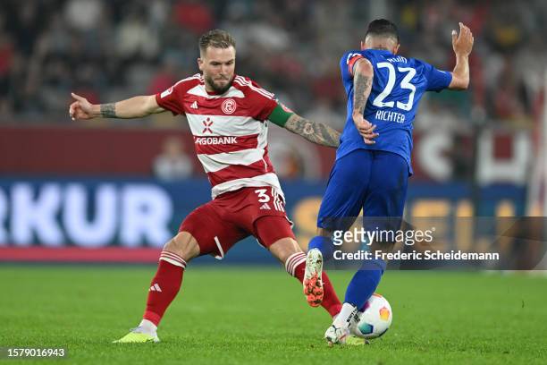 Andre Hoffmann of Duesseldorf challenges Marco Richter of Berlin during the Second Bundesliga match between Fortuna Düsseldorf and Hertha BSC at...