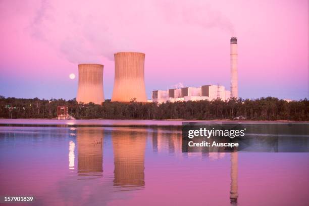 Water vapour and unseen oxides of carbon and other elements rise from a coal-fired power station, contributing to air pollution and greenhouse gases....