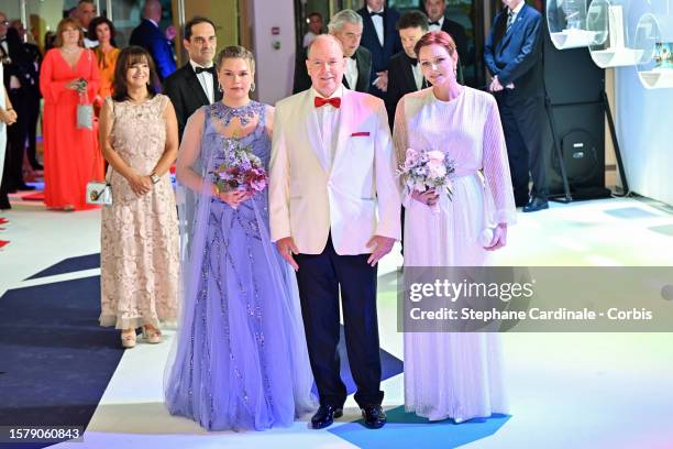 Camille Gottlieb, Prince Albert II of Monaco and Princess Charlene of Monaco attend the Red Cross Ball 2023 on July 29, 2023 in Monaco, Monaco.