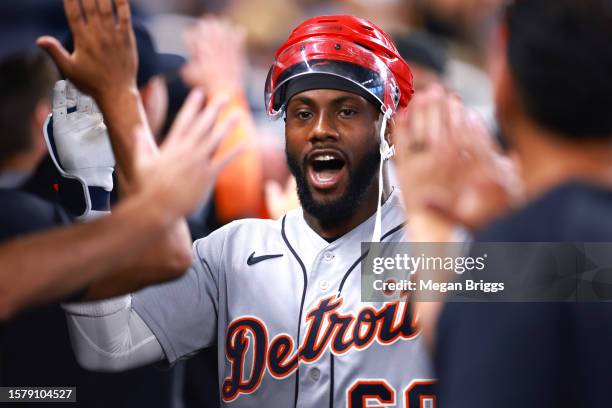 Akil Baddoo of the Detroit Tigers celebrates with teammates after hitting a home run against the Miami Marlins during the second inning at loanDepot...