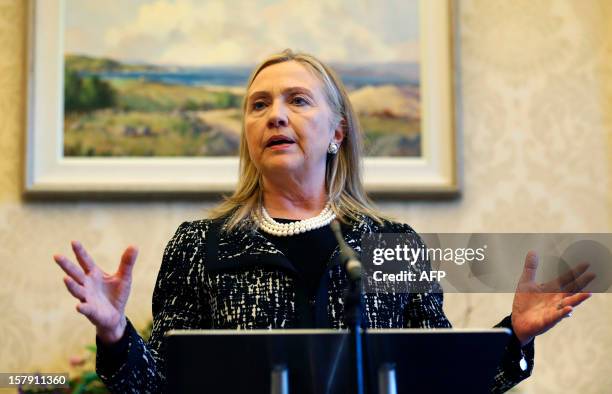 Secretary of State Hillary speaks during a news conference during her visit to Stormont Castle in Belfast December 7, 2012. Northern Ireland's...
