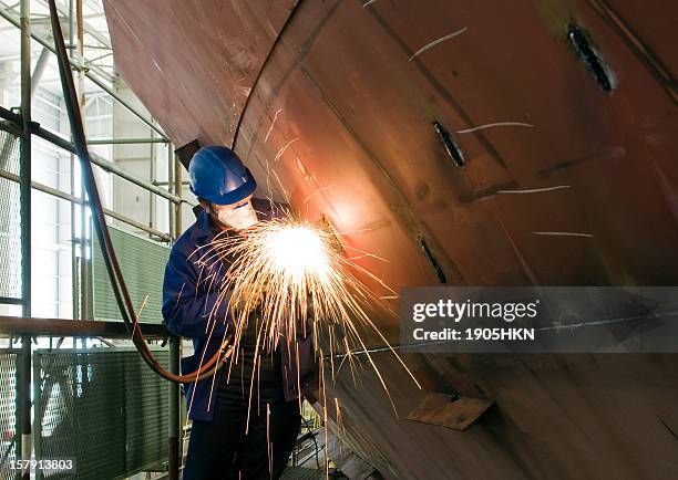 metalworker - jumping of boat stockfoto's en -beelden