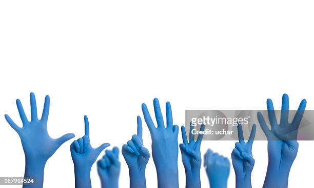 doctors hands - surgical glove stock pictures, royalty-free photos & images