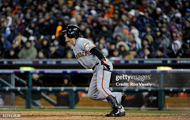 Ryan Theriot of the San Francisco Giants singles to lead off the top of the 10th inning during Game 4 of the 2012 World Series against the Detroit...