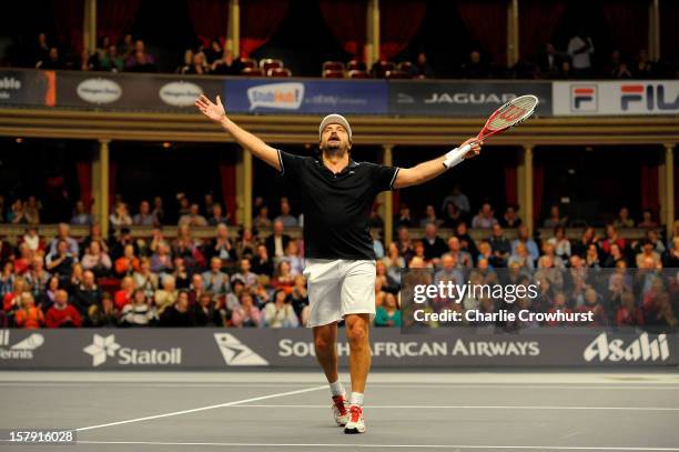 Henri Leconte of France celebrates a point during the match against Mats Wilander of Sweden on Day Three of the Statoil Masters Tennis at the Royal...