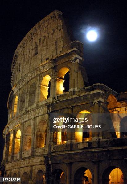 September Moon Rome View of the moon eclipse behind the Coliseum, in downtown Rome, 09 ...