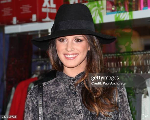 Actress Shenae Grimes attends the Get Festive With Frankie B. And Kitson event at Kitson on Robertson on December 6, 2012 in Beverly Hills,...