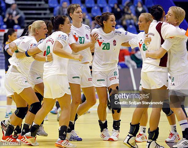 Hungary players celebrate victory against Spain during the Women's European Handball Championship 2012 Group C match between Hungary and Spain at...