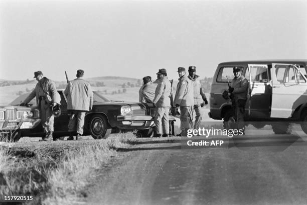 Federal troops block the road near Wounded Knee during the siege of the town on March 16 as about 200 American Indians occupe the town of Wounded...