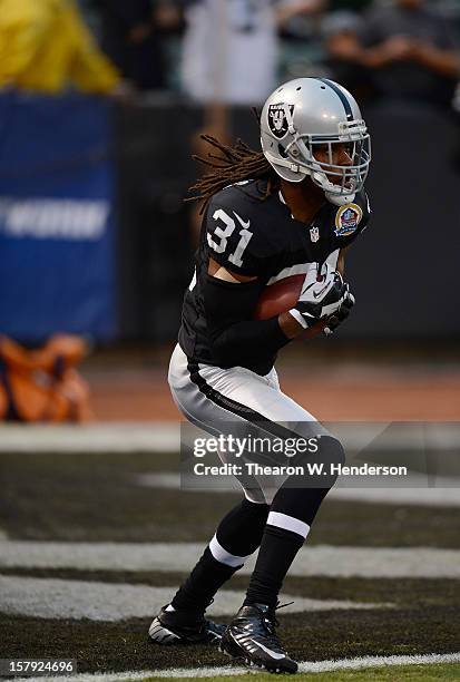 Coye Francies of the Oakland Raiders warms up in pre-game before playing the Denver Broncos at Oakland-Alameda County Coliseum on December 6, 2012 in...