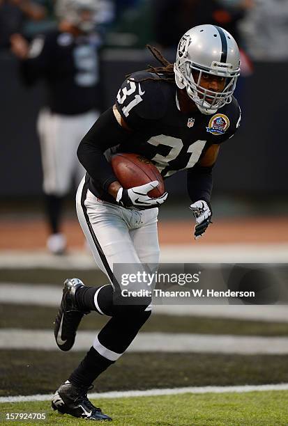 Coye Francies of the Oakland Raiders warms up in pre-game before playing the Denver Broncos at Oakland-Alameda County Coliseum on December 6, 2012 in...