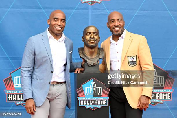 Ronde Barber poses with his presenter and brother, Tiki Barber, during the 2023 Pro Football Hall of Fame Enshrinement Ceremony at Tom Benson Hall Of...