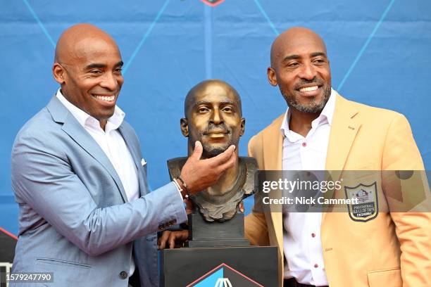 Ronde Barber poses with his presenter and brother, Tiki Barber, during the 2023 Pro Football Hall of Fame Enshrinement Ceremony at Tom Benson Hall Of...