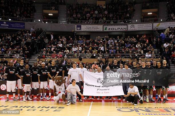 Special Olympics athletes pose with Besiktas JK Istanbul players and FC Barcelona Regal players during a Special Olympics ceremony before the...