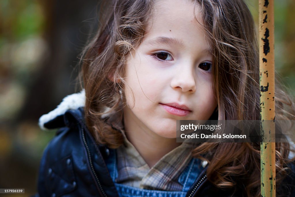 Close-up of boy with long hair