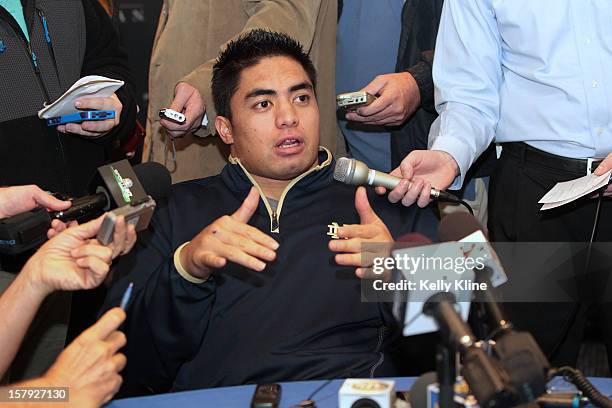 Heisman finalist linebacker Manti Te'o of the University of Notre Dame Fighting Irish answers questions from reporters during an informal press...