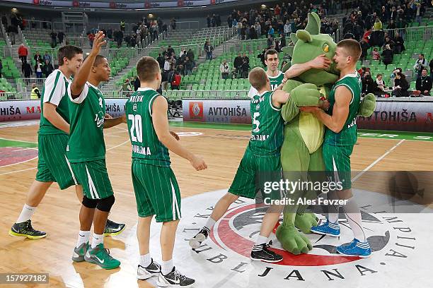 Alen Omic, #23 of Union Olimpija Ljubljana and Luka Rupnik, #5 of Union Olimpija Ljubljana celebrate victory at the 2012-2013 Turkish Airlines...